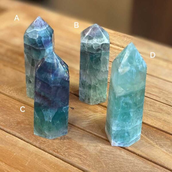 group of rainbow fluorite polished points